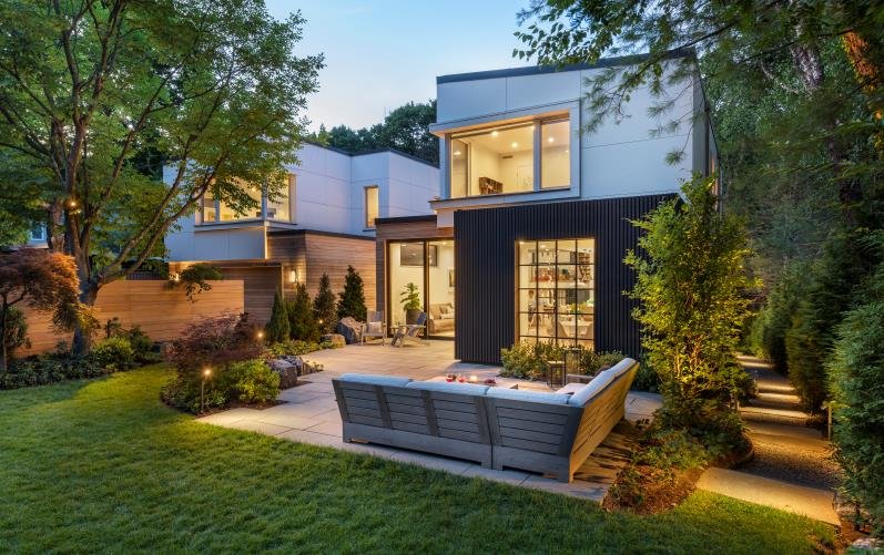 Outdoor living space with lush plant material